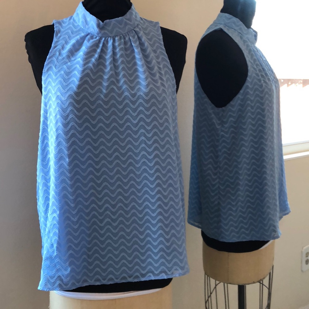 Maeve:  blue sleeveless blouse